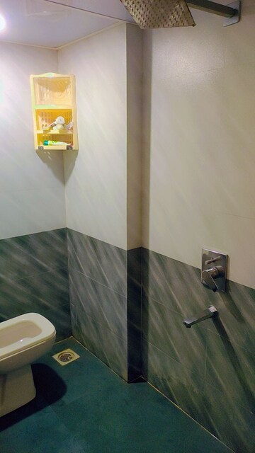 Bathroom in 2 BHK Apartment at Royal Palms Garden View, Goregaon East – for Rent