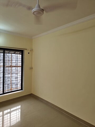Room in 2 BHK Apartment at Royal Palms Garden View, Goregaon East – for Rent