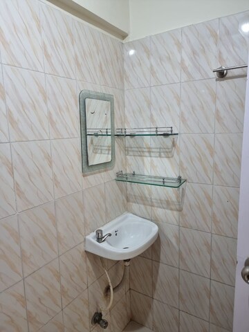 Bathroom in 2 BHK Apartment at Royal Palms Garden View, Goregaon East – for Rent