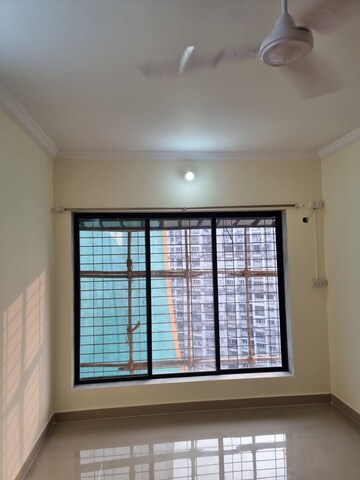 Room in 2 BHK Apartment at Royal Palms Garden View, Goregaon East – for Rent
