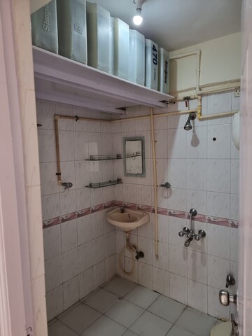 Bathroom in 2 BHK Apartment at Royal Palms Garden View, Goregaon East – for Rent