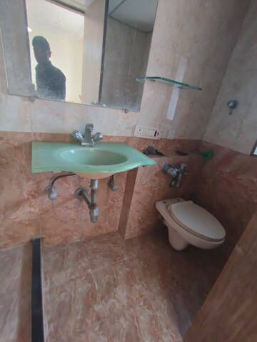 Bathroom in 2 BHK Apartment at Royal Palms, Goregaon East – for Rent