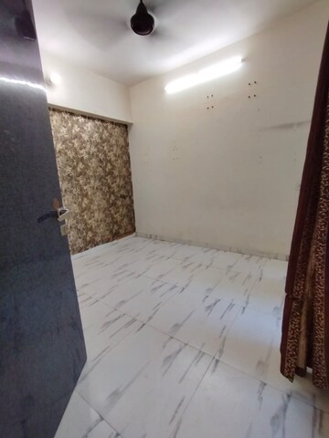 Room in 2 BHK Apartment at Royal Palms Garden View, Goregaon East – for Rent