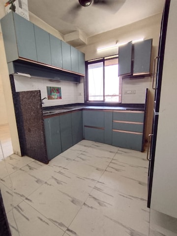 Kitchen in 2 BHK Apartment at Royal Palms Garden View, Goregaon East – for Rent