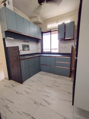 Kitchen in 2 BHK Apartment at Royal Palms Garden View, Goregaon East – for Rent