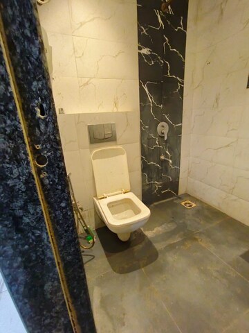 Bathroom in 2 BHK Apartment at Royal Palms Garden View, Goregaon East – for Rent