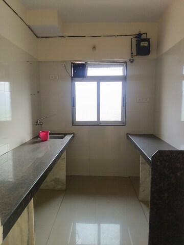 Kitchen in 2 BHK Apartment at Vihang Hills, Ghodbunder Road – for Sale