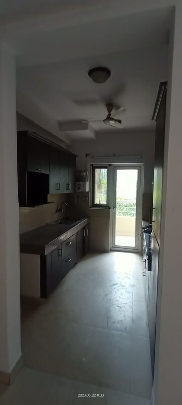 Kitchen in 3.5 BHK Apartment at Purvanchal Royal Park, Sector 137 – for Rent