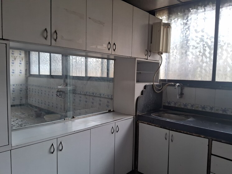 Kitchen, shree-ravechi-apartments 2 Bedroom 1500 Sq.Ft. Apartment In Kopar Khairane Navi Mumbai 7994039