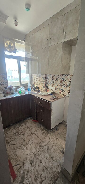 Kitchen in 2 BHK Apartment at Amrapali Riverview, Amrapali Leisure Valley – for Rent