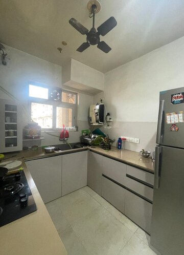 Kitchen in 2 BHK Apartment at Rodas Enclave Woodstock, Patlipada – for Rent