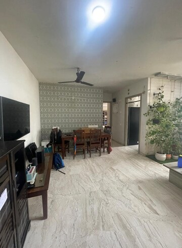 Living Room in 2 BHK Apartment at Rodas Enclave Woodstock, Patlipada – for Rent