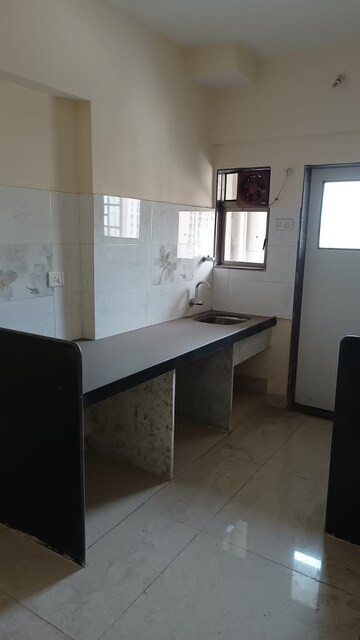 Kitchen in 4 BHK Apartment at Sector 15 – for Sale