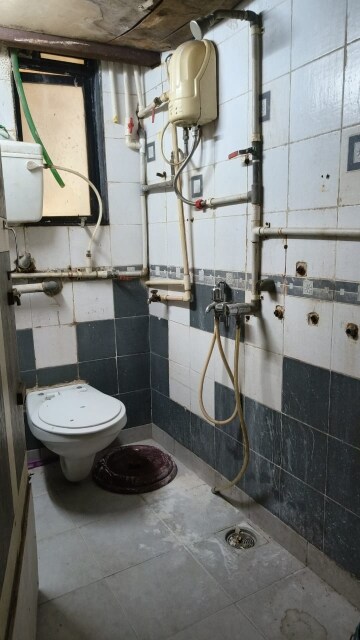 Master Bedroom in Studio Apartment at Raman CHS, Santacruz East – for Rent