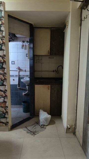 Kitchen in Studio Apartment at Raman CHS, Santacruz East – for Rent