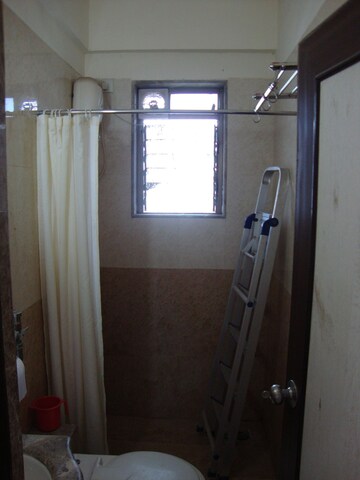 Bathroom in 2 BHK Apartment at Rajkamal Heights, Parel – for Rent