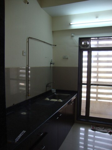 Kitchen in 2 BHK Apartment at Rajkamal Heights, Parel – for Rent