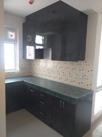 Kitchen in 1 BHK Apartment at Zara Aavaas, Sector 104 – for Rent