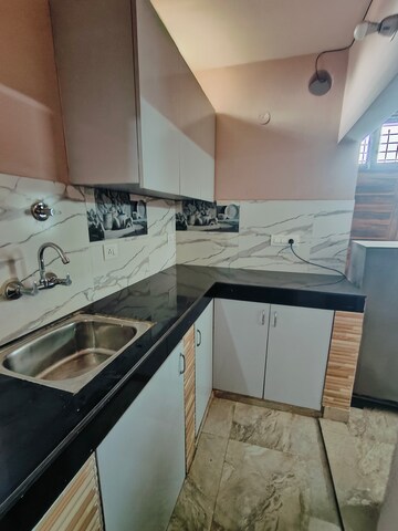 Kitchen in 1 RK Builder Floor at Ansal Sushant Lok I, Sector 43 – for Rent