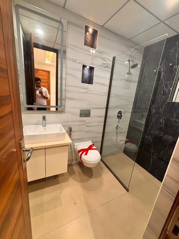 Bathroom in 3 BHK Apartment at International Airport Road – for Rent
