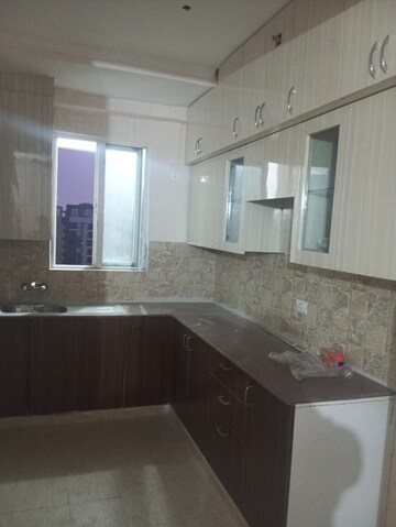 Kitchen in 3 BHK Apartment at Amrapali Golf Homes, Sector 4, Greater Noida – for Rent