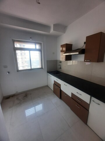 Kitchen in 1 BHK Apartment at Puranik City Phase III, Ghodbunder Road – for Rent