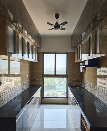 Kitchen in 3 BHK Apartment at Rajesh Raj Infinia, Malad West – for Rent