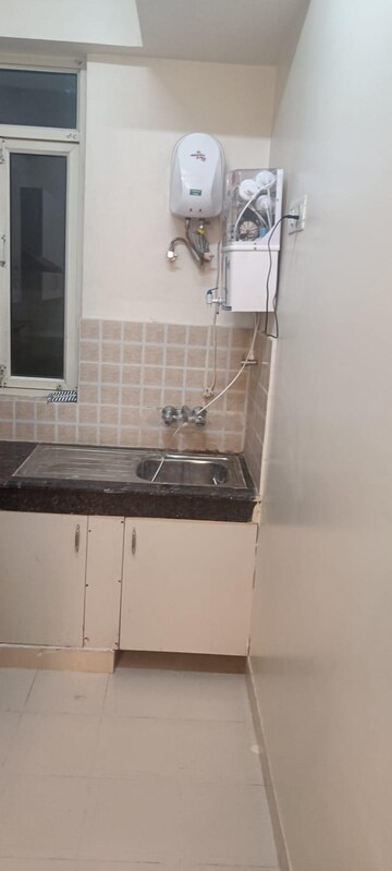 Kitchen in 2 BHK Apartment at Shree Vardhman Mantra, Sector 67 – for Rent