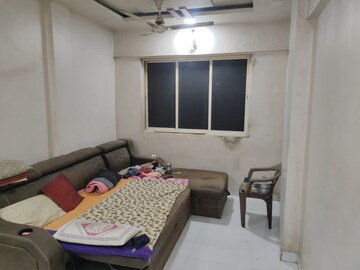 Living Room in 1 BHK Apartment at Ideal Tower III, Mira Road – for Sale
