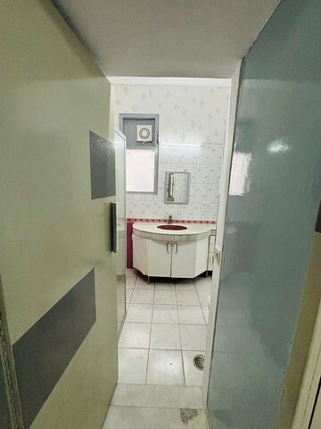 Bathroom in 1 BHK Builder Floor at Ansal Sushant Lok I, Sector 43 – for Rent