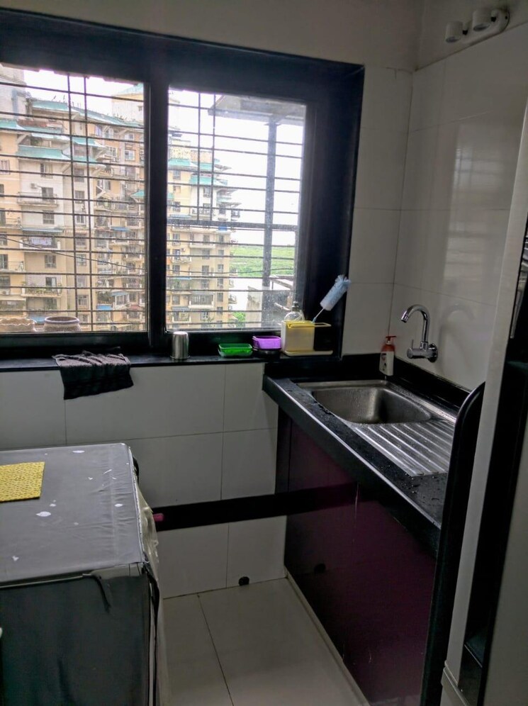 Kitchen, nri-complex-phase-i 3 Bedroom 2110 Sq.Ft. Penthouse In Seawoods Sector 58 Navi Mumbai 7997436