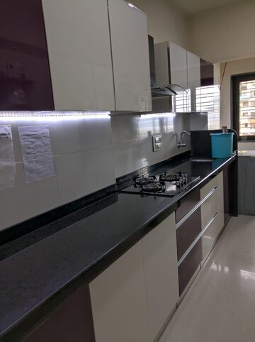Kitchen in 3 BHK Penthouse at NRI Complex Phase I, Seawoods Sector 58 – for Rent