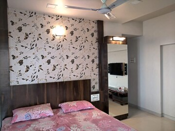 Bedroom in 3 BHK Penthouse at NRI Complex Phase I, Seawoods Sector 58 – for Rent