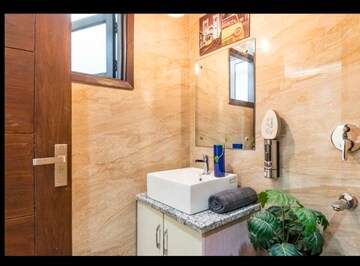 Bathroom in 2.5 BHK Builder Floor at Freedom Fighters Enclave – for Rent