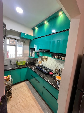Kitchen in 2 BHK Apartment at Gaur Atulyam, Omicron I Greater Noida – for Rent