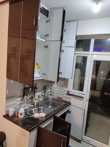 Kitchen in 2 BHK Apartment at Gaur City 2 - 11th Avenue, Sector 16c Greater Noida – for Rent