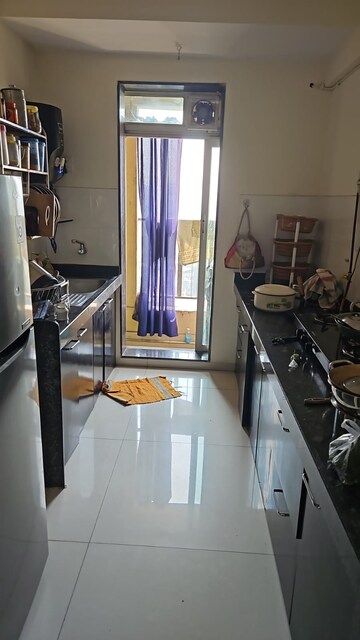 Kitchen in 2 BHK Apartment at Rustomjee Urbania Aurelia, Majiwada – for Rent