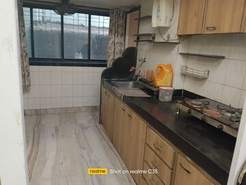 Kitchen in 2.5 BHK Apartment at Padmavati Apartment Mahim, Mahim – for Rent