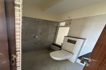 Bathroom in 2 BHK Apartment at Omkar Signet, Malad East – for Rent