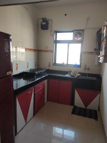 Kitchen in 2 BHK Apartment at Haware Splendor, Kharghar – for Rent