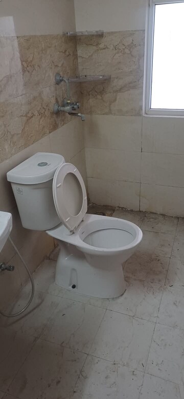 Bathroom in 2 BHK Apartment at Amrapali Golf Homes, Sector 4, Greater Noida – for Sale