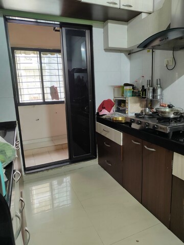 Kitchen in 2.5 BHK Apartment at Sawan Highness, Kharghar – for Sale