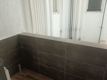 Bathroom in 3 BHK Apartment at Kolte Patil Centria, Undri – for Sale