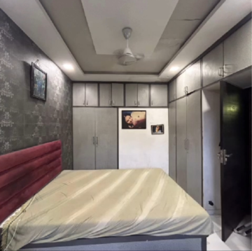 Bedroom in 2 BHK Apartment at Mahalaxmi – for Sale