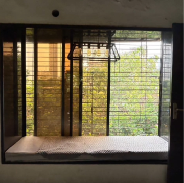 Bedroom in 2 BHK Apartment at Mahalaxmi – for Sale