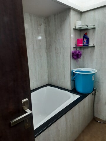 Bathroom in 3 BHK Apartment at Seawoods Sector 58 – for Rent