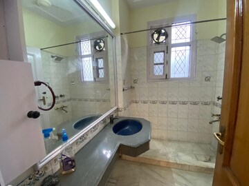 Bathroom in 4 BHK Builder Floor at Defence Colony – for Rent
