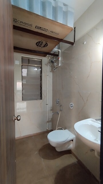 Bathroom in 2 BHK Apartment at Raunak City Sector 4 D8, Kalyan West – for Rent