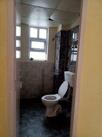 Bathroom in 1 BHK Apartment at Auric City Homes, Sector 82 – for Sale