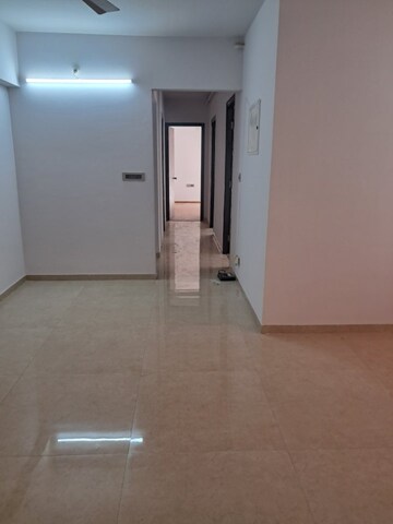 Living Room in 2 BHK Apartment at Lodha Palava City Lakeshore Greens, Dombivli East – for Sale